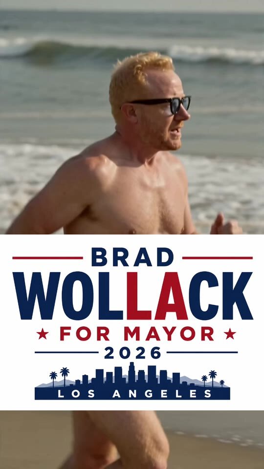 Candidate Brad: Brad running on the beach under a Wollack for Mayor 2026 sign